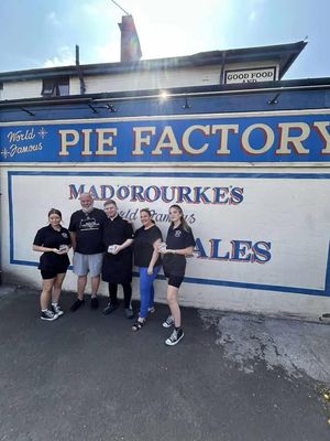 Members of the group outside Mad O Rourke's Pie Factory, Tipton