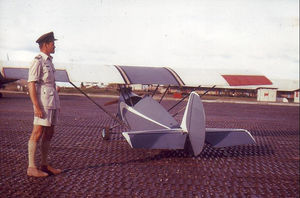 Ray with the Kuching Flyer, a high winged man-carrying monoplane which he built while based in Bornea