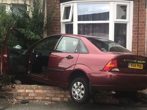 Supporting image for story: Driver flees after crashing car into garden wall in Wolverhampton