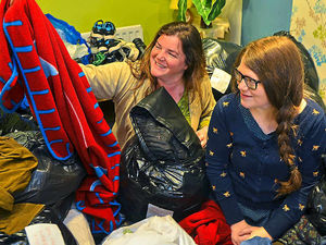 Supporting image for story: Oswestry public backs refugee aid bid through bags of donations