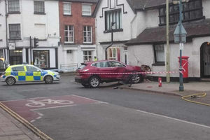 Supporting image for story: Oswestry town centre evacuated after car crashes into shop breaking gas main pipe