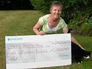 Supporting image for story: Cash handed over from marathon effort