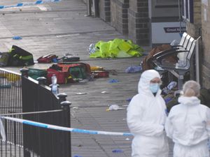 Supporting image for story: Boy stabbed and ‘knifeman’ seen twice at barbers in 24 hours before train attack