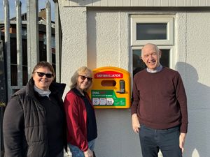 Supporting image for story: Church partnership sees defibrillator installed outside church hall