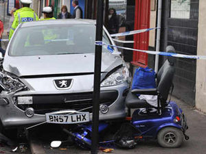 Supporting image for story: Runaway car hits pensioner on mobility scooter