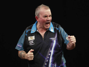Supporting image for story: Phil Taylor 'Powers' into last eight