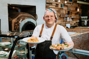 Chef Mario runs the Pizzeria and rustles up some amazing pizza and pasta. In Picture: Mario Baciu