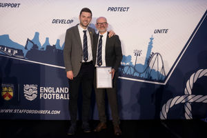 CEO of the Staffordshire FA Adam Evans (right) was honoured for 25 years of service. Pictured with Chair of the Staffordshire FA Matt Hancock. Pic: Staffordshire FA