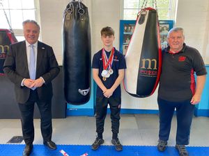 Supporting image for story: MP praise for up and coming young boxer