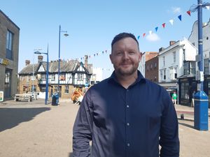 Stourbridge BID manager Ben Thompson in the high street where new bunting has been installed to brighten up the town