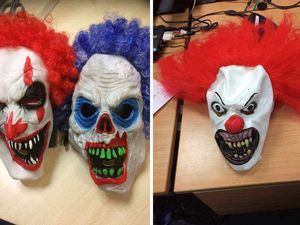 Supporting image for story: Horror clown craze: 17-year-old girl arrested after jumping in front of car in a mask and suit