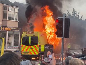 Supporting image for story: Police injured as bricks thrown in protest following stab deaths of three girls