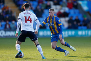 Taylor Moore of Shrewsbury Town and Jack Iredale of Bolton Wanderers (AMA)