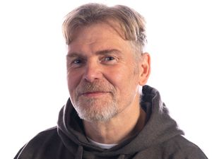 Supporting image for story: Local sports and exercise therapist publishes third book for his profession