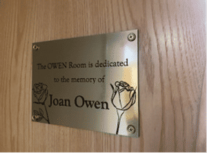 A plaque in memory of Joan Owen. 