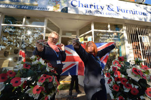 Putting on a display for Remembrance Day, (left) volunteer Jenny Davies, and (right) manager Beckie Lenton, at The Rural Charity, Whitchurch Road, Shrewsbury