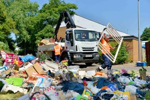 Fly-tipping previously being cleared up in Sutton Hill, Telford