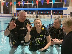 Victoria with members of the diving school.