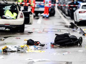 Supporting image for story: Asylum seeker arrested after car driven into union protest in Munich
