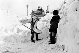 A snow scene from the March 1947 blizzards. Unnamed boy clearing a road on the way from Wolverhampton to Claverley.