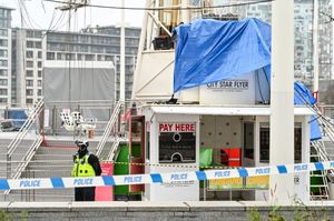 Police at the cordoned off Star Flyer ride in Centenary Square, Birmingham, on Friday morning, December 13, 2024.   =