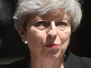 Supporting image for story: May still not learned her lesson