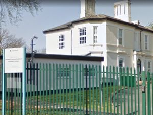 Supporting image for story: Teacher who dragged pupil from seat and restrained him can continue teaching