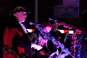 Kington Mayor Councillor Philip Sell speaking to the crowds at the Christmas lights switch-on event. Image by Andy Compton