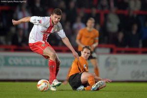 David Edwards of Wolverhampton Wanderers and John Moushino of Stevenage.