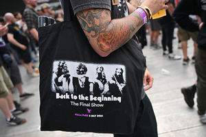 Fans watch support acts, during British rock band Black Sabbath's "Back to The Beginning" concert, Ozzy Osbourne's final ever gig as Black Sabbath's frontman at Villa Park in Birmingham, central England on July 5, 2025. Osbourne, who revealed in 2020 that he has Parkinson's disease, will join Tony Iommi, Geezer Butler and Bill Ward for the all-day "Back To The Beginning" show in Birmingham, central England, where the heavy metal giants formed in 1968. (Photo by ANDY BUCHANAN / AFP) (Photo by ANDY BUCHANAN/AFP via Getty Images)          