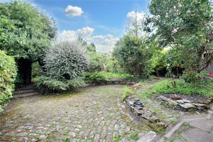 Outside patio area. The Grade II listed cottage is going to auction in December. Picture: Rightmove and Nock Deighton.