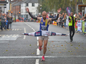 Jim Hickinbottom is the first to cross the line