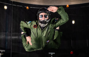 An iFly coach at The Bear Grylls Adventure in Birmingham recreates an iconic Top Gun flying scene