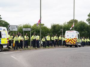 Supporting image for story: Anti-migrant and anti-racism protesters clash outside asylum seeker hotel