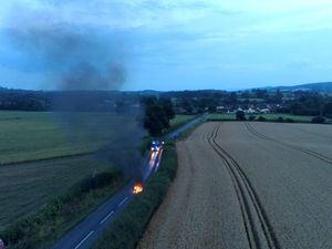 Supporting image for story: Drone footage shows firefighters' speedy response to bike fire