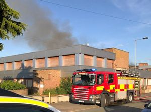 Smoke pours out of the factory. Photo: West Midlands Ambulance Service
