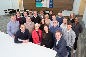 The Higgs Corporate team with Richard Griffiths, head of corporate, second left on front row.