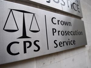 A view of signage for the Crown Prosecution Service