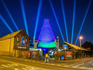 Supporting image for story: Red House Glass Cone lit up to support carers