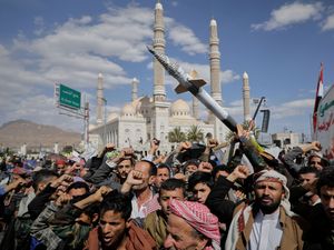 Houthi supporters chant slogans during an anti-US and anti-Israel rally in Sanaa, Yemen