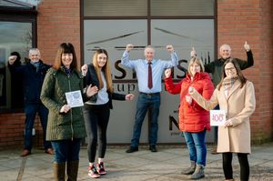 The family of Stans Superstore in 2021, celebrating what would have been Stan Faulks' 100th Birthday. From left to right: Robert Faulks, Sarah Dodsworth (Front), Bethan Faulks, Andrew Faulks, Lisa Faulks, Peter Faulks and Katie Chaplin.