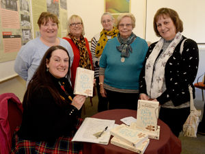 Supporting image for story: Author visits museum to meet fans