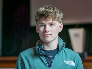 Supporting image for story: Student returns to American football team as coach after spinal cord injury