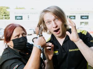 Supporting image for story: No time to mullet over as trainer Alex prepares for charity chop