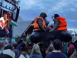 Supporting image for story: Banksy confirms migrant inflatable boat is his artwork amid Tory criticism