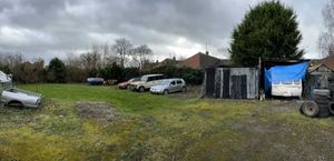 The land behind the garage was described as 'scruffy and unkempt'