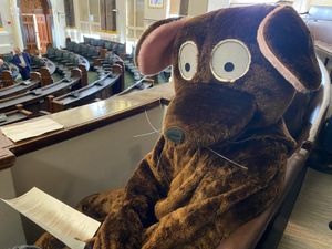 A man in a rat costume at a full council meeting at Birmingham City Council House on Tuesday, April 8. Credit: Alexander Brock. Permission for use for all LDRS partners.
