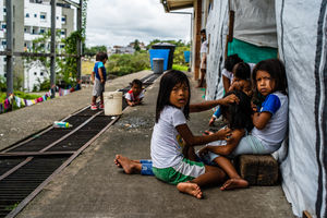 Children play, all from the displaced Wounan tribe, at a former school in Buenaventura