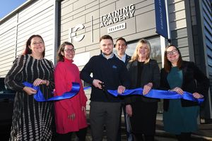 Bekki Phillips, In-Comms Training’s COO, Claire Critchell, Business Support at Telford & Wrekin Council, James Morgan, In-Comm’s apprentice of the year (cutting ribbon), Gareth Jones, MD of In-Comm Training, Georgina Barnard, MD of the Black Country and Marches Institute of Technology and Kathryn Jones, Head of Partnerships at Marches Local Enterprise Partnership