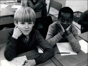 Michael Edwards, aged eight, and his best friend Ray in a picture that was reproduced around the world